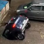 [動画0:26] インドの地下駐車場？車が地面に消えていく