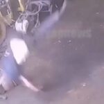 [動画0:05] タイヤが爆発！吹っ飛ばされて地面に叩きつけられる男性